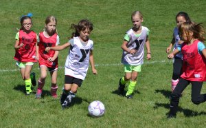 Футбол для девочек: со скольки лет, какая польза